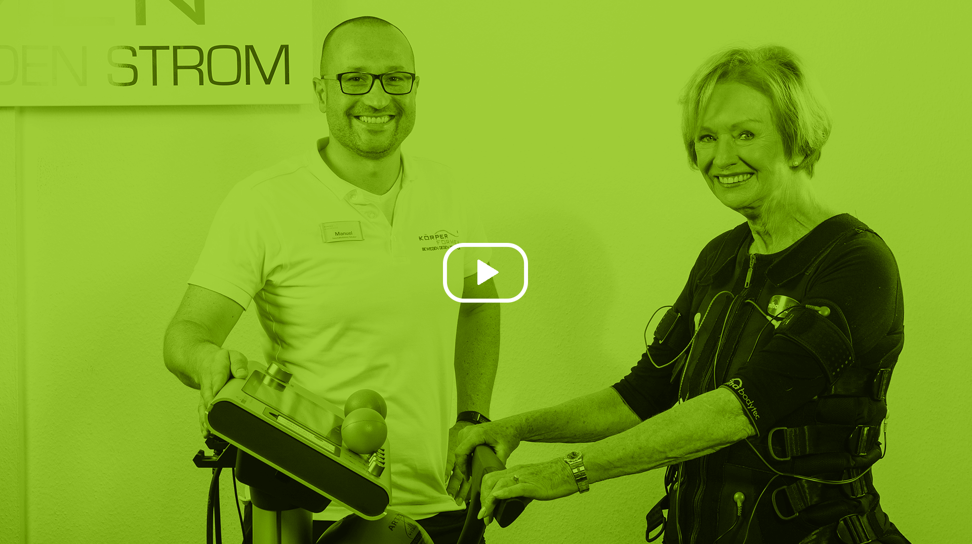 Video Thumbnail - Trainer und Kundin am EMS Gerät während des Trainings